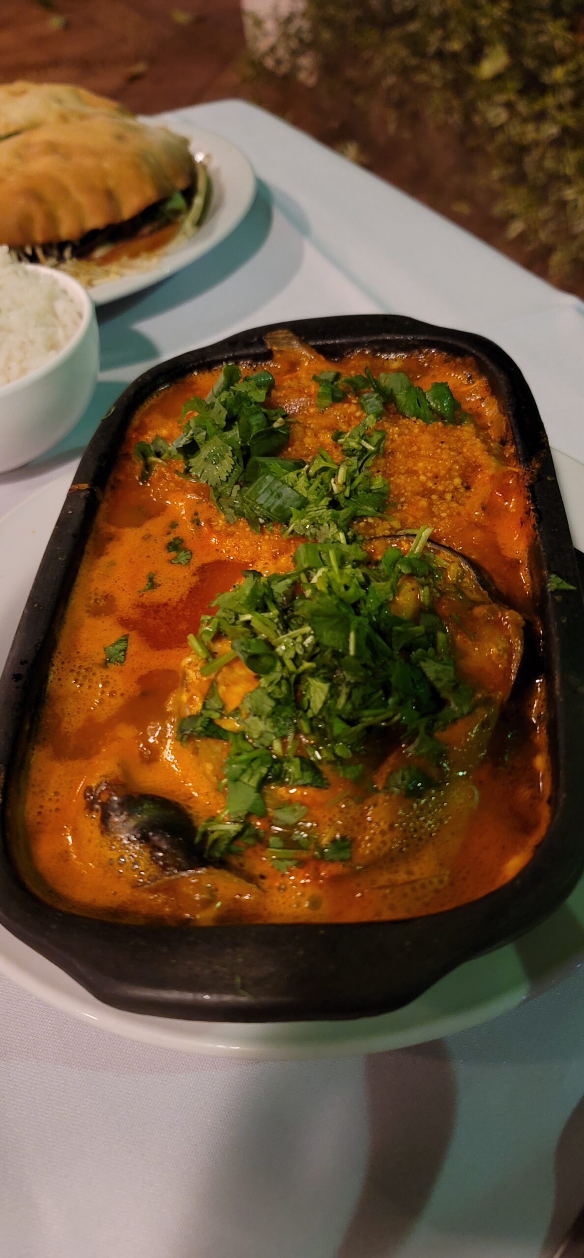 A serving dish containing muqueca de peixe