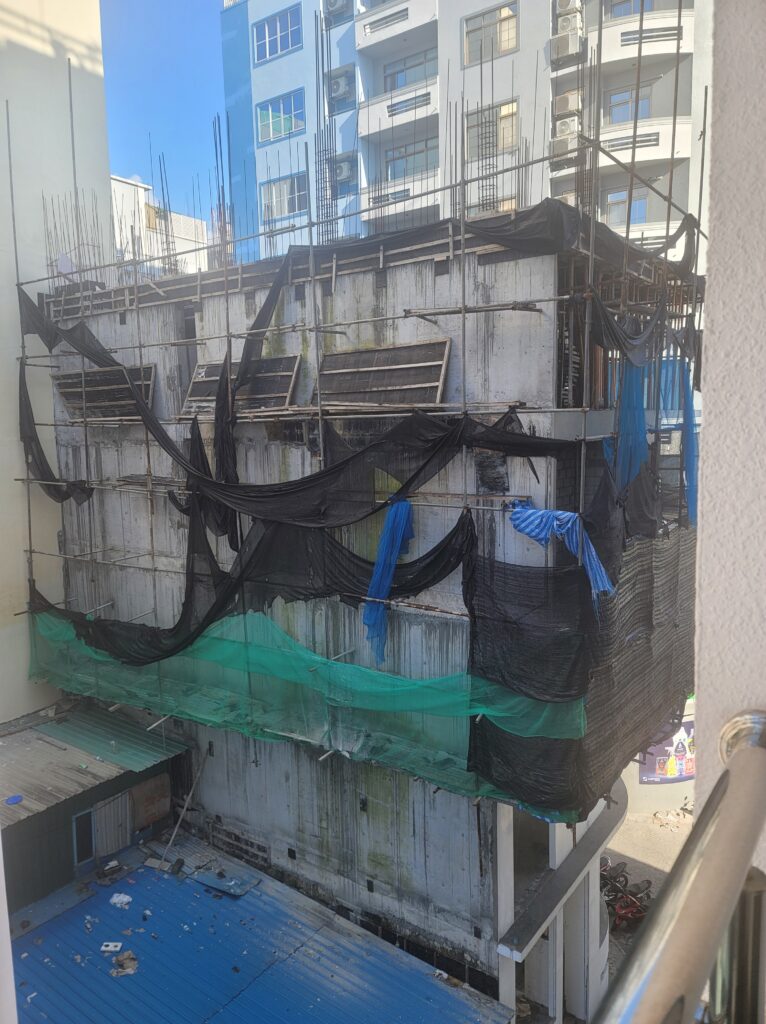 The view of a dilapidated build from our hotel room